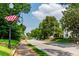 Picturesque street view featuring American flags lining the sidewalk at 5152 Suggs St, Powder Springs, GA 30127