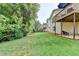 Large, lush backyard offers plenty of space for outdoor activities and recreation at 708 Edgeley Ln, Lawrenceville, GA 30044