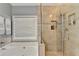 Modern bathroom featuring glass shower, separate tub, and decorative tiling at 708 Edgeley Ln, Lawrenceville, GA 30044