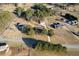 Birds eye view of a home in a wooded setting, with surrounding homes at 140 Moseley Dr, Stockbridge, GA 30281