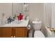 Functional bathroom features a toilet and a vanity with ample storage space at 1955 Shawn Wayne Se Cir, Atlanta, GA 30316