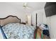 This cozy bedroom features a ceiling fan and a comfortable bed at 1955 Shawn Wayne Se Cir, Atlanta, GA 30316
