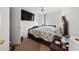 Bright bedroom featuring a large bed, ceiling fan, and ample natural light at 1955 Shawn Wayne Se Cir, Atlanta, GA 30316