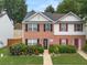 Charming two-story home with brick facade and manicured landscaping for great curb appeal at 1955 Shawn Wayne Se Cir, Atlanta, GA 30316