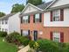 An attractive two-story home featuring a brick facade, complemented by dark shutters at 1955 Shawn Wayne Se Cir, Atlanta, GA 30316