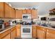 Functional kitchen with matching appliances and plenty of countertop space for easy meal preparation at 1955 Shawn Wayne Se Cir, Atlanta, GA 30316