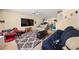 A cozy living room featuring a large TV and comfortable seating creating the perfect Gathering space at 1955 Shawn Wayne Se Cir, Atlanta, GA 30316