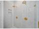 New construction walk-in shower featuring dual shower heads, mosaic tiling, and convenient niche at 200 Whispering Pines Dr, Woodstock, GA 30188