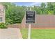 Community entrance sign for Sharon Springs Park, marking a private homeowner entrance at 2430 Hemrick Rd, Cumming, GA 30041