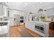 Kitchen featuring stainless steel appliances and large island with built in microwave at 2430 Hemrick Rd, Cumming, GA 30041