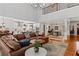 Open-concept living space with a view of the kitchen and dining area at 2430 Hemrick Rd, Cumming, GA 30041
