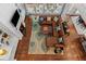 Open concept living room with fireplace, hardwood floors, and abundant natural light at 2430 Hemrick Rd, Cumming, GA 30041