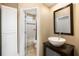 Cozy bathroom showcasing a vessel sink and a view into the shower/tub area at 315 Melrose Ave, Decatur, GA 30030