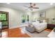 Inviting bedroom with hardwood floors, a ceiling fan, and a private balcony at 315 Melrose Ave, Decatur, GA 30030