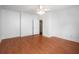 Spacious bedroom featuring hardwood floors, a ceiling fan, and ample natural light at 315 Melrose Ave, Decatur, GA 30030