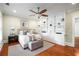 Charming bedroom with hardwood floors, a ceiling fan, and custom built-in shelving at 315 Melrose Ave, Decatur, GA 30030