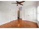 Bedroom boasts hardwood floors, ceiling fan, and closet doors for ample storage at 315 Melrose Ave, Decatur, GA 30030