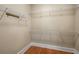Walk-in closet featuring hardwood floors, ample storage space and wire shelving at 315 Melrose Ave, Decatur, GA 30030