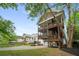 Beautiful home featuring dual screened porches, lush green space, and a lovely exterior design at 315 Melrose Ave, Decatur, GA 30030