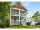Stylish two-story house with double porch, appealing architecture, and well-maintained landscaping at 315 Melrose Ave, Decatur, GA 30030