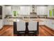 Spacious kitchen featuring island, granite countertops, and modern appliances at 315 Melrose Ave, Decatur, GA 30030