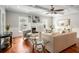 Living room featuring hardwood floors, fireplace, and modern decor at 315 Melrose Ave, Decatur, GA 30030