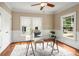 Bright home office with hardwood floors, natural light, and a modern glass desk at 315 Melrose Ave, Decatur, GA 30030