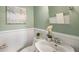 Cozy powder room with sink and decorative accents at 315 Melrose Ave, Decatur, GA 30030