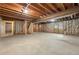 Spacious unfinished basement featuring exposed wooden beams at 3741 Bays Ferry Way, Marietta, GA 30062