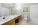 Bathroom features a double sink vanity, a tile floor, and a combined shower and tub at 3741 Bays Ferry Way, Marietta, GA 30062