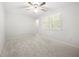 A light-filled bedroom featuring a ceiling fan, neutral carpet, and ample space at 3741 Bays Ferry Way, Marietta, GA 30062
