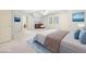 Bright bedroom features neutral tones, a ceiling fan, and an ensuite bathroom at 3741 Bays Ferry Way, Marietta, GA 30062