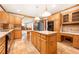 Functional kitchen equipped with an island, granite countertops, and stainless steel appliances at 3741 Bays Ferry Way, Marietta, GA 30062