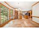 Bright eat-in kitchen with tile floors, wood cabinets, and large windows offering scenic views at 3741 Bays Ferry Way, Marietta, GA 30062