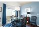 Cozy dining area featuring stylish decor, natural light, and easy access to the outdoor space at 2305 Keenland Ct, Cumming, GA 30040