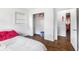 Bright bedroom boasts closet and hardwood floors at 2696 Eldorado Pl, Snellville, GA 30078