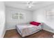 Bright bedroom features hardwood floors and neutral decor at 2696 Eldorado Pl, Snellville, GA 30078