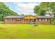 Charming one-story brick home with lush front yard at 2696 Eldorado Pl, Snellville, GA 30078