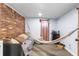 Fun room features hammock and accent brick wall at 2696 Eldorado Pl, Snellville, GA 30078