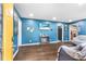 Inviting living room with hardwood floors, a cozy fireplace, and a flat-screen TV at 2696 Eldorado Pl, Snellville, GA 30078