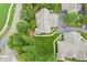Beautiful single-Gathering home with lush landscaping and sidewalk path leading to the front entrance at 6107 Malloway Ct # B-6107, Cumming, GA 30041