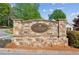 Stone entrance sign for Muirfield at Windermere, a beautiful and established residential community at 6107 Malloway Ct # B-6107, Cumming, GA 30041