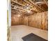 Unfinished basement space ready for customization, featuring exposed beams and insulation for a modern industrial aesthetic at 6613 Encore Blvd, Atlanta, GA 30328