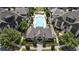 Charming clubhouse overlooking the community pool, surrounded by manicured landscaping and offering a welcoming gathering space at 6613 Encore Blvd, Atlanta, GA 30328