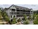 Charming townhome with beautiful landscaping, multiple stories, and a welcoming curb appeal at 6613 Encore Blvd, Atlanta, GA 30328