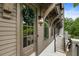 Elegant front door with a decorative wreath and sidelights, leading up to a grand exterior at 6613 Encore Blvd, Atlanta, GA 30328