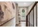 Stylish hallway with hardwood floors, decorative art, and a glimpse of the exterior at 6613 Encore Blvd, Atlanta, GA 30328