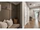 Inviting hallway with custom built in storage, stylish decor, and hardwood floors at 6613 Encore Blvd, Atlanta, GA 30328