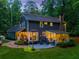 Back exterior features a patio and closed-in porch at 7250 Hunters Branch Dr, Atlanta, GA 30328