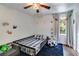 Cozy bedroom with a playful theme, natural light, and comfortable furnishings at 7250 Hunters Branch Dr, Atlanta, GA 30328